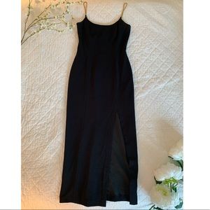 Black evening dress with gold straps